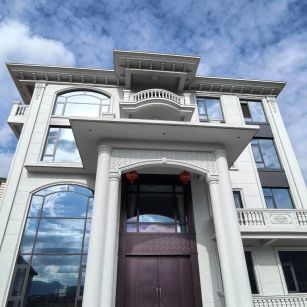 昭通白麻别墅外墙干挂石材效果示例