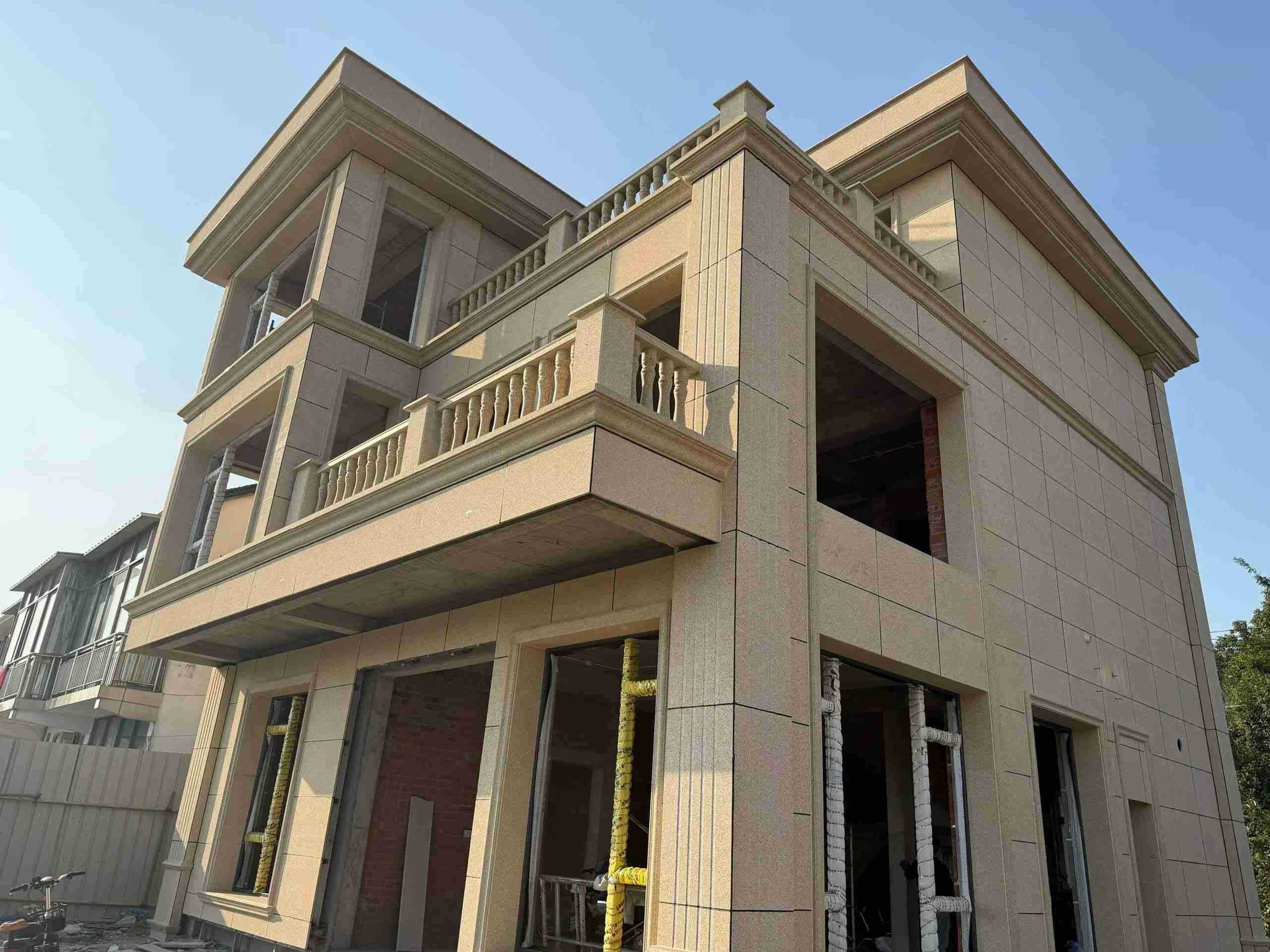 昭通 黄金麻花岗岩石材荔枝面外墙干挂效果展示